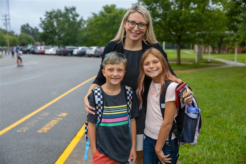 People smile on the first day of school